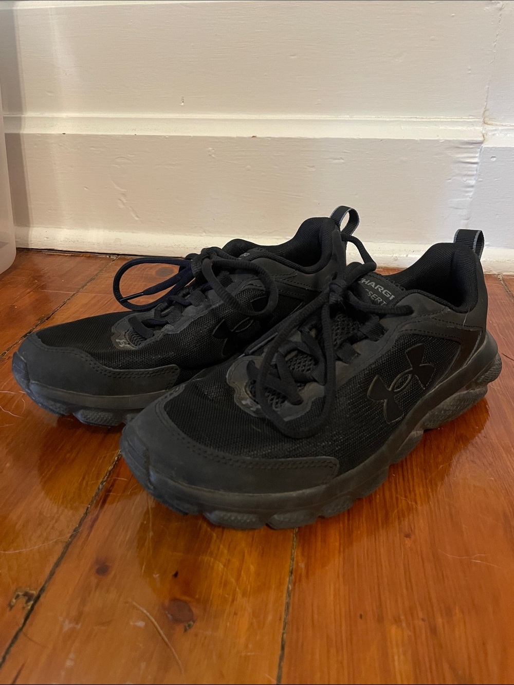 Under Armour Charged Assert Women’s  Black Athletic Sneakers